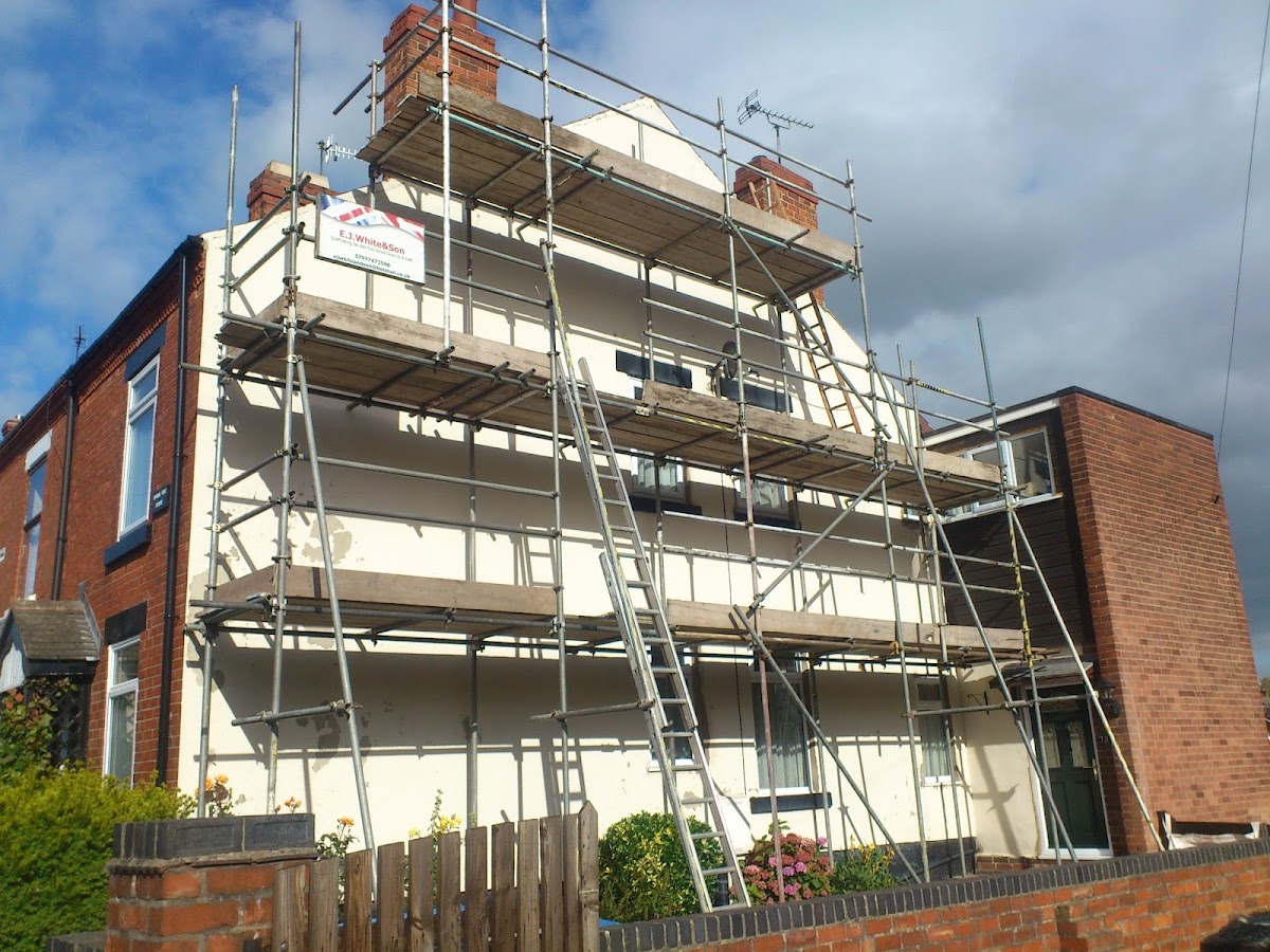 Three lift scaffold on a rendered end terrace